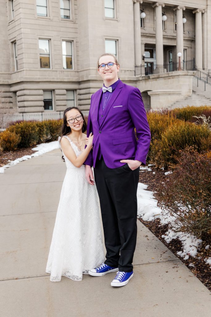 Boise, Idaho state Capitol building couples photography. Boise wedding photography. Purple color scheme. Couples photography poses.