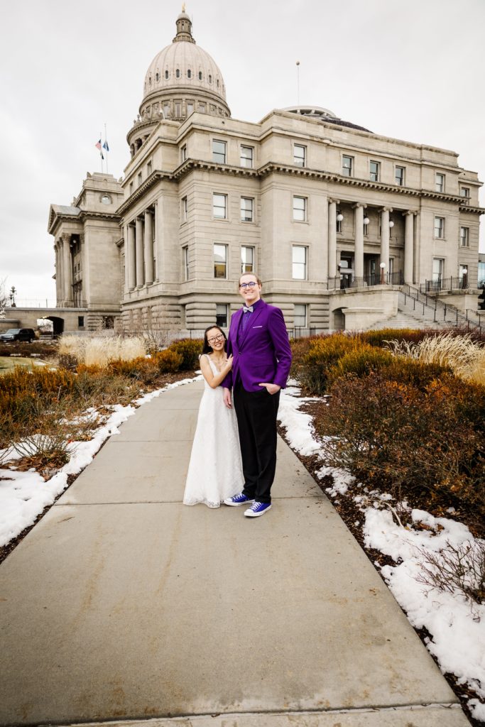 Boise, Idaho state Capitol building couples photography. Boise wedding photography. Purple color scheme. Couples photography poses.