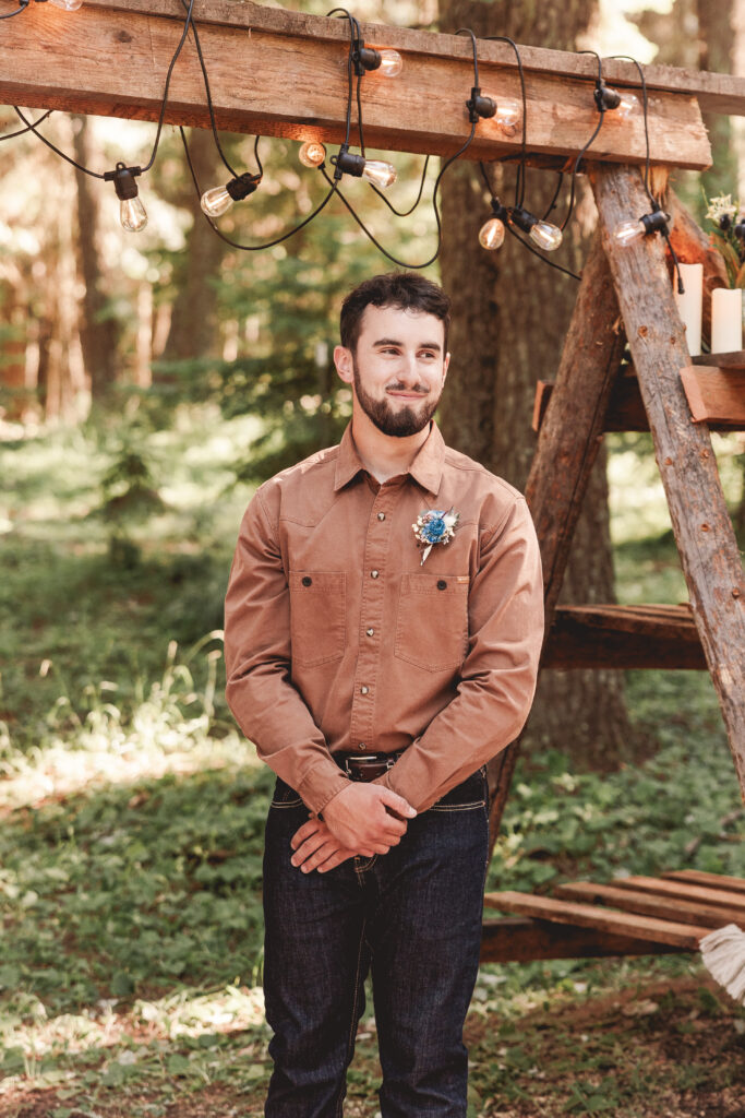 groom waiting on his bride outdoor wedding